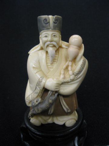 Chinese Carved Ivory Figurine of a Man