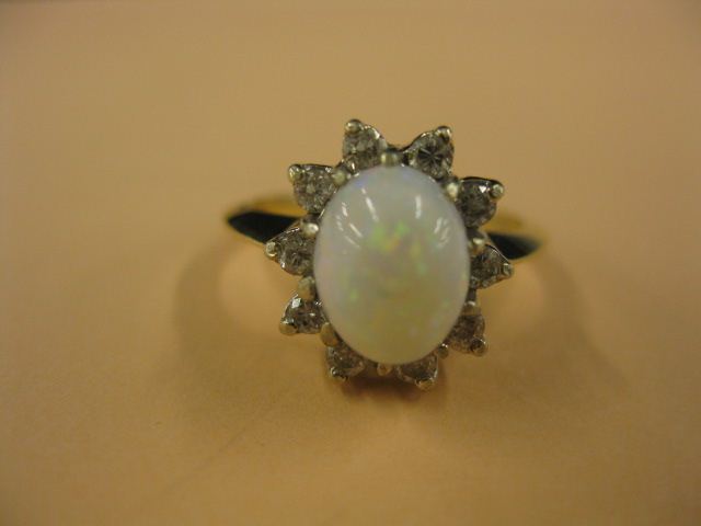 Opal & Diamond Ring fiery oval cabachon