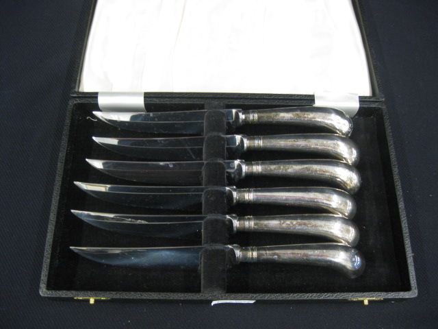 6 Silverplate Steak Knives pistol