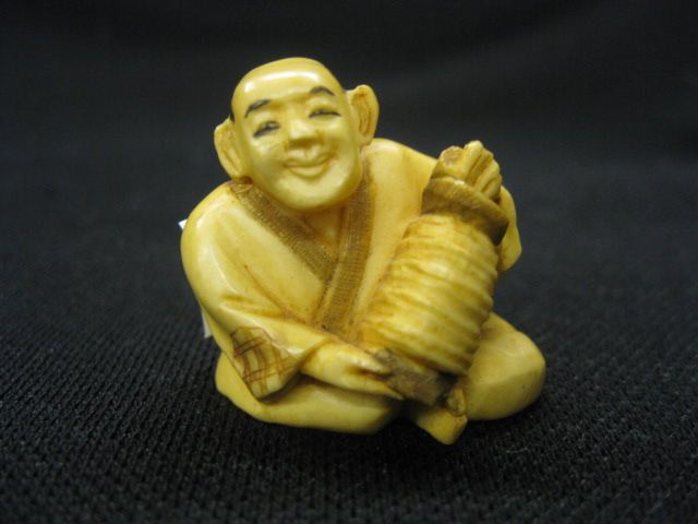 Carved Ivory Netsuke of a Seated 14ffd7