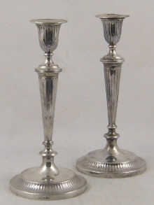 A pair of Adam style silver candlesticks 14ffff