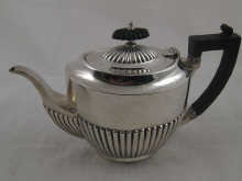 A silver ''Queen Anne'' style teapot
