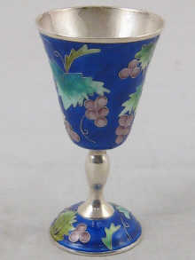 A cloisonne enamelled wine cup tests
