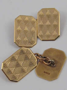 A pair of 9 ct. gold cufflinks