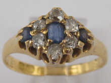 An 18 ct gold diamond and sapphire 15005c