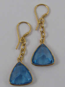 A pair of triangular cut topaz 150068