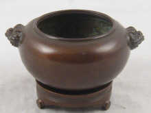 A Chinese bronze incense burner