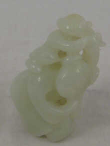 A Chinese jade carving of a woman