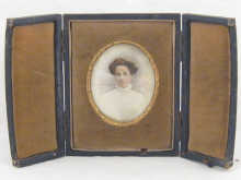 An oval miniature of a lady in travelling