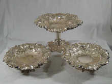 A fine suite of three silver cake