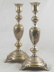 A pair of silver plated Shabat candlesticks
