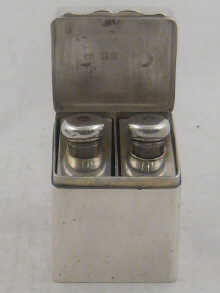 An unusual silver box containing 15010f