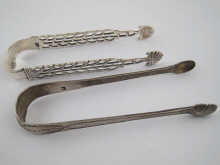 Two pairs of Georgian silver tongs 150110