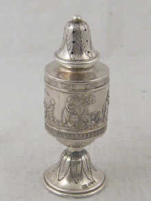 A hallmarked silver pepperette with