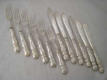 A set of six pairs of silver plated