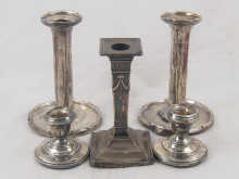 Sterling silver. Two pairs of candlesticks