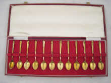 A boxed set of twelve silver gilt