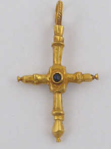 A yellow metal (tests 22 ct gold) cross