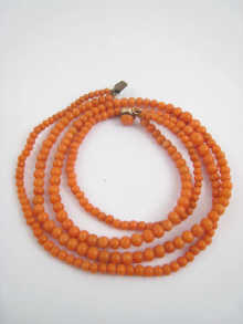 A graduated two row coral bead