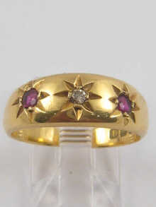 A hallmarked 18 ct gold ruby and