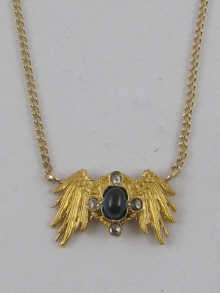 A hallmarked 9 ct gold cabochon sapphire