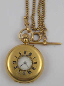 An 18 ct gold half hunter fob watch