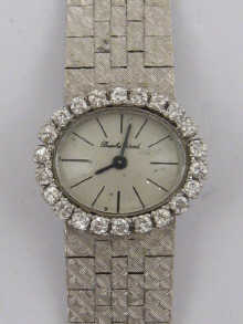 A 9 ct white gold ladies wrist watch