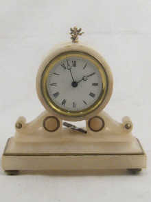 An alabaster cased mantel clock