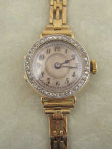 A 15 ct gold lady s wrist watch 1501a9