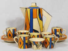 A part coffee set by Clarice Cliff