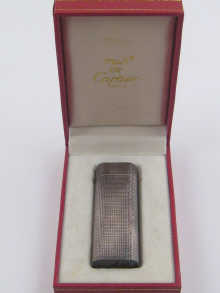 A silver plated Cartier Paris cigarette