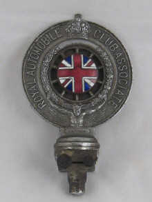 An early R.A.C. car badge dated