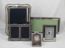 Two silver fronted clocks together 15021d