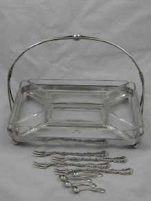 A silver plated entree serving