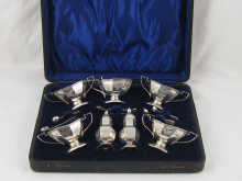 A boxed late Victorian cruet set of