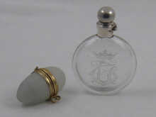 Two scent flasks one clear glass