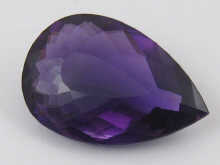 A loose polished pear shape amethyst