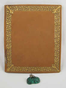A suede leather folder blotter with