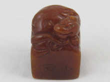 A Chinese brown stone seal with mythical