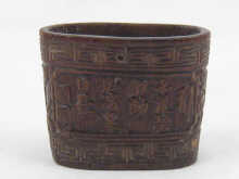 A Chinese bamboo bucket shaped