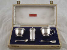 A boxed silver cruet set with Celtic 15030f