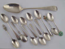 A quantity of silver spoons being