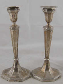 A pair of hallmarked silver candlesticks