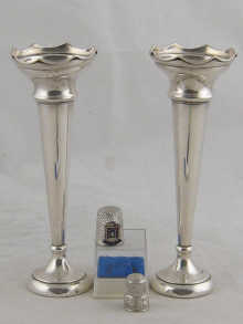 A pair of silver specimen vases 150324