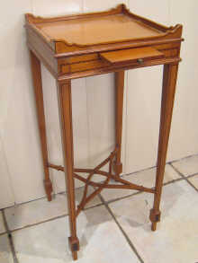 A small Edwardian satinwood galleried 1503cc