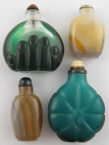 Four Chinese glass snuff bottles one
