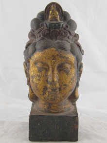 A gilt metal Tibetan Buddha head the