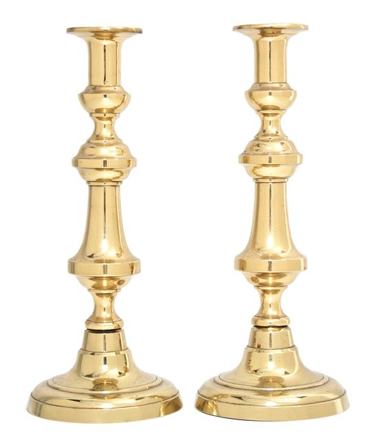 A Pair of Continental Brass Candlesticks