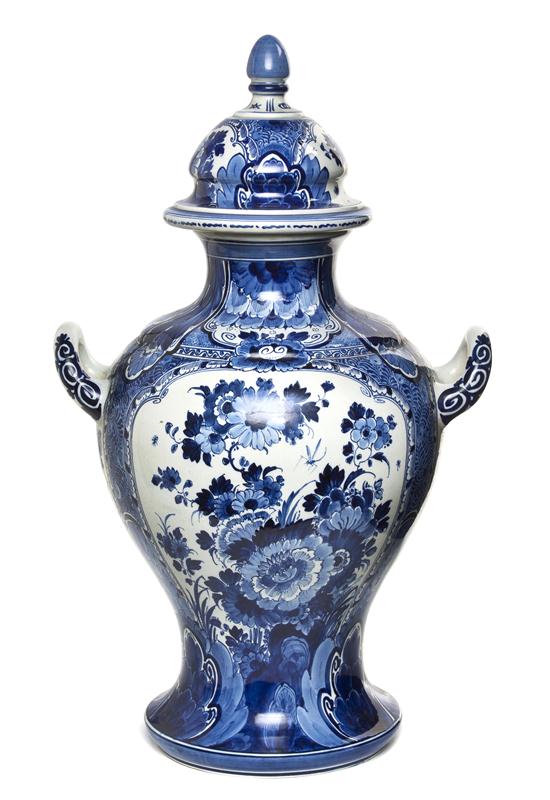 A Delft Ceramic Covered Vase of baluster