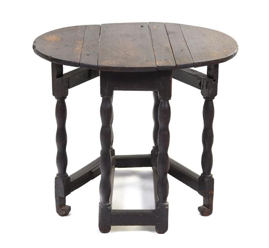 A Continental Oak Drop Leaf Table 150754